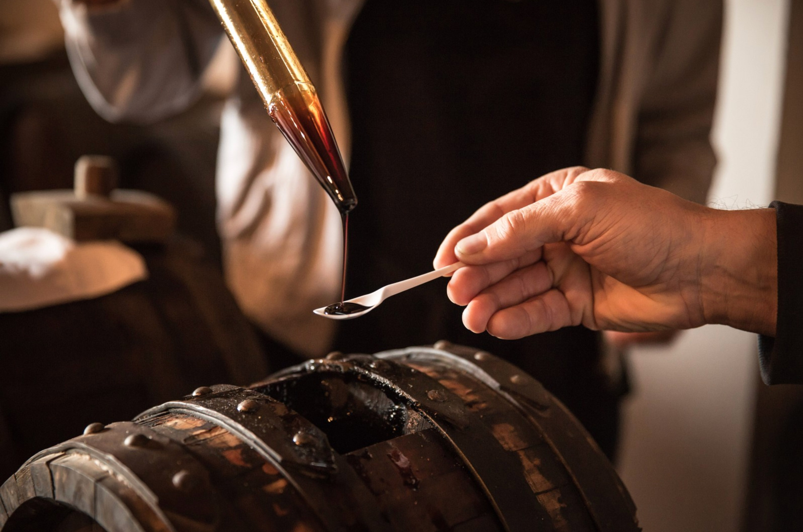 A row of barrels in a Modena balsamic vinegar loft, to be photographed